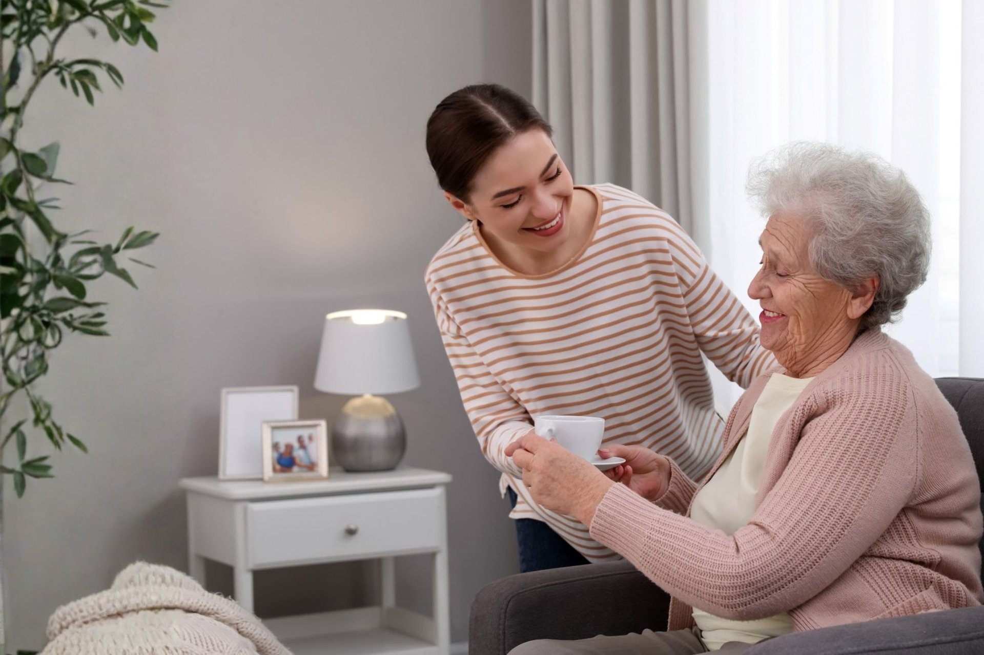 caregiver assisting senior